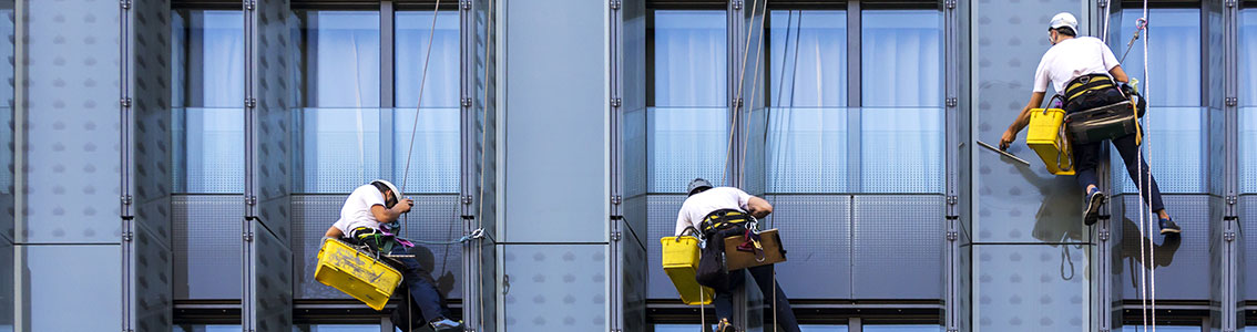 Workers outside skyscraper